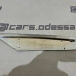 TESLA Model S restyling Накладка люверса нижняя левая хром 1056379-00-C